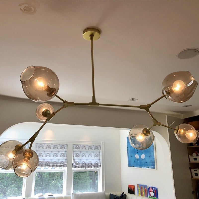 Elegant Pendant Light with Customizable Drop Height and Glass Shades for Home